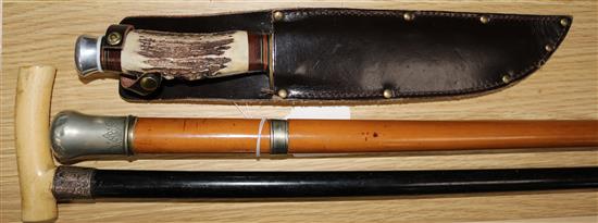 A malacca cane sword stick, an ivory and silver collared walking stick and a Wright & Son Bowie knife